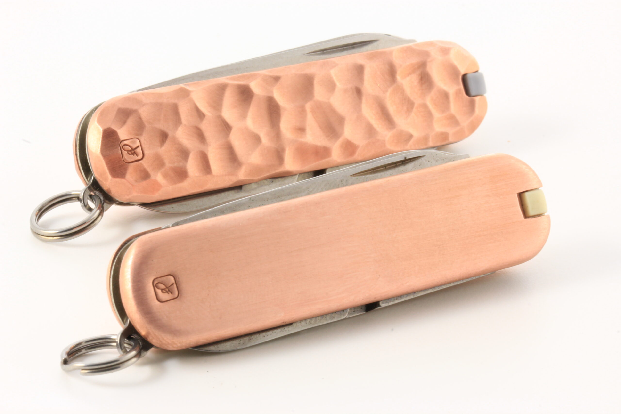 Copper set of custom Victorinox Classic SD pocket knives