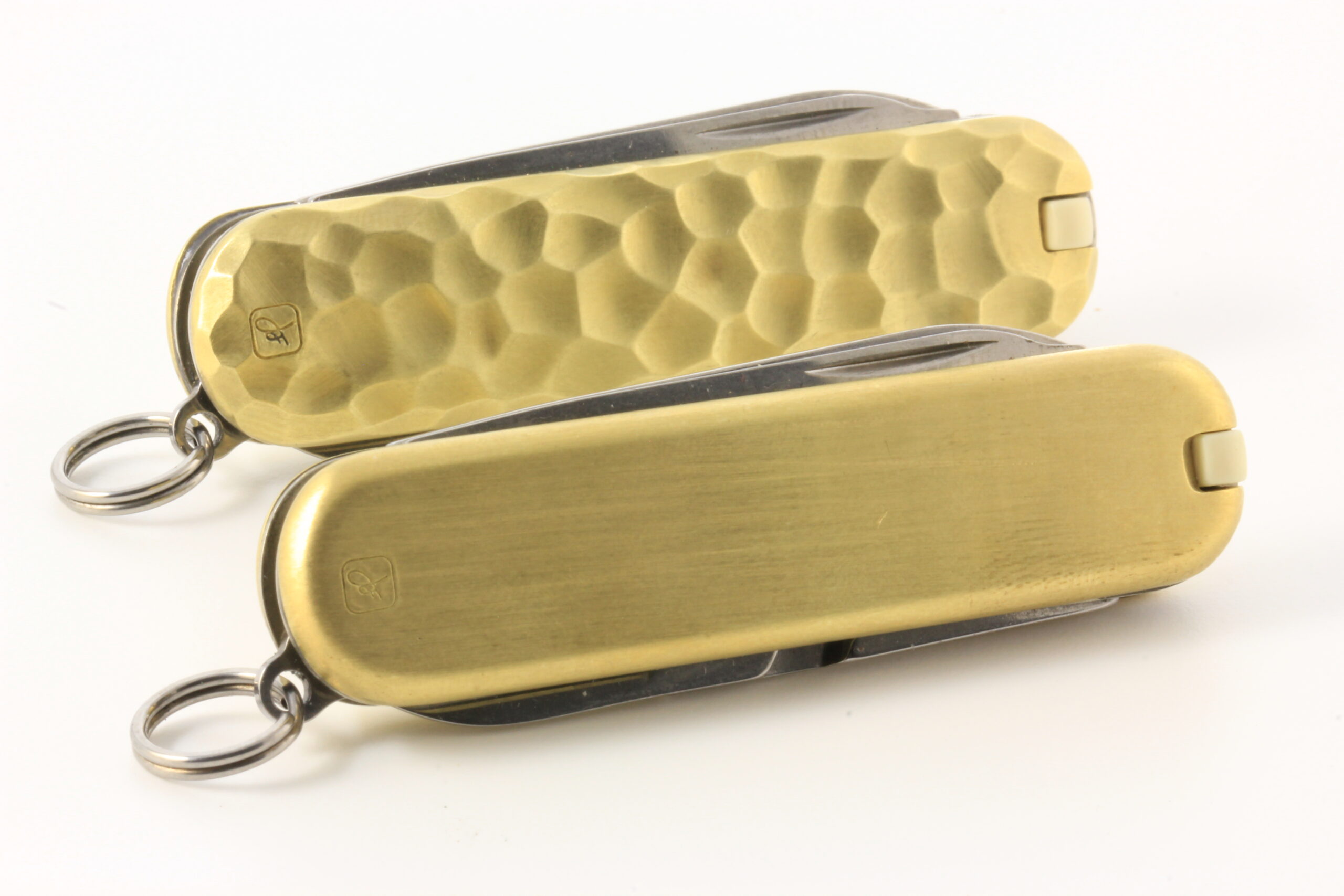 Brass set of custom Victorinox Classic SD pocket knives