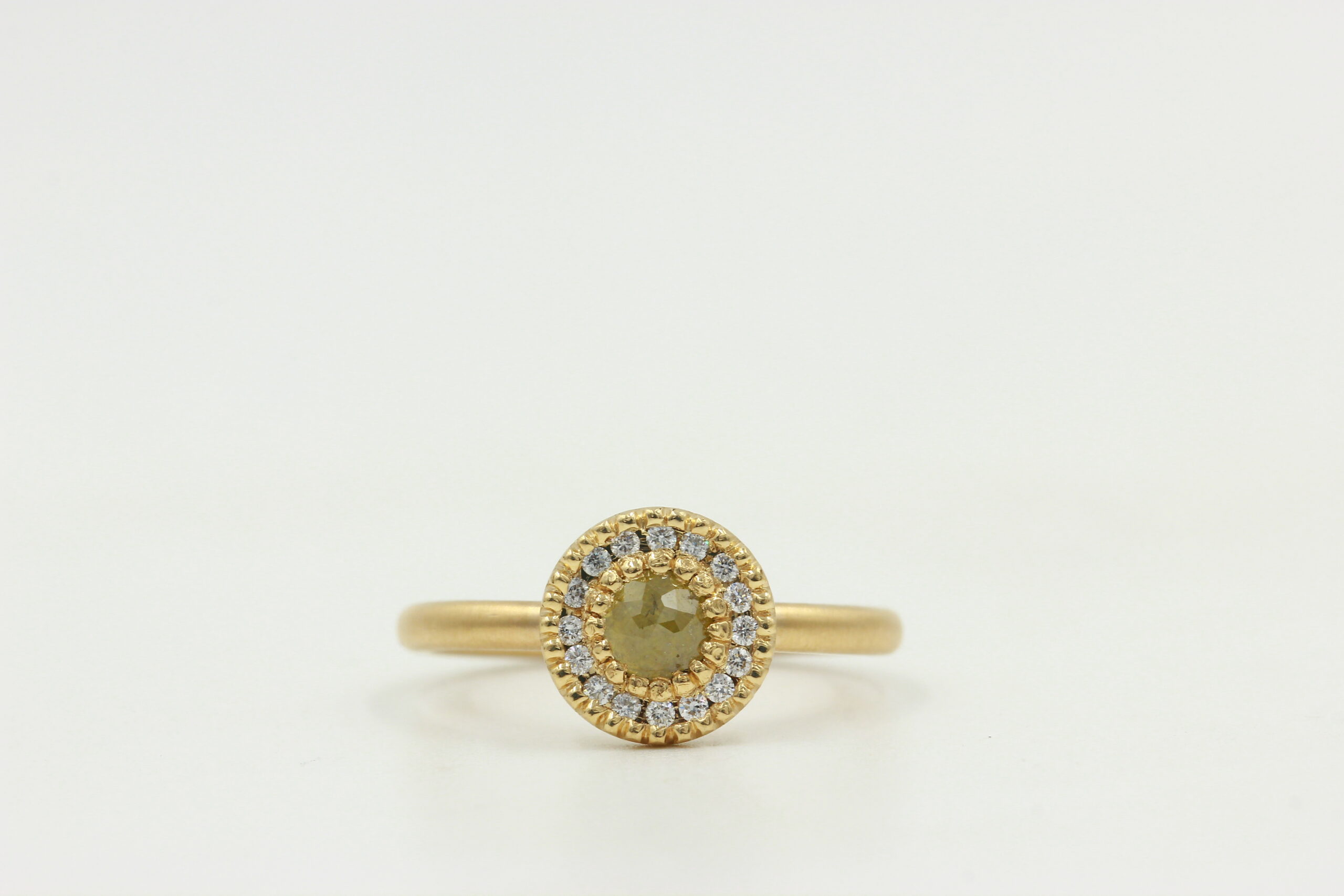 18k Yellow gold ring with .52 carat natural yellow diamond.