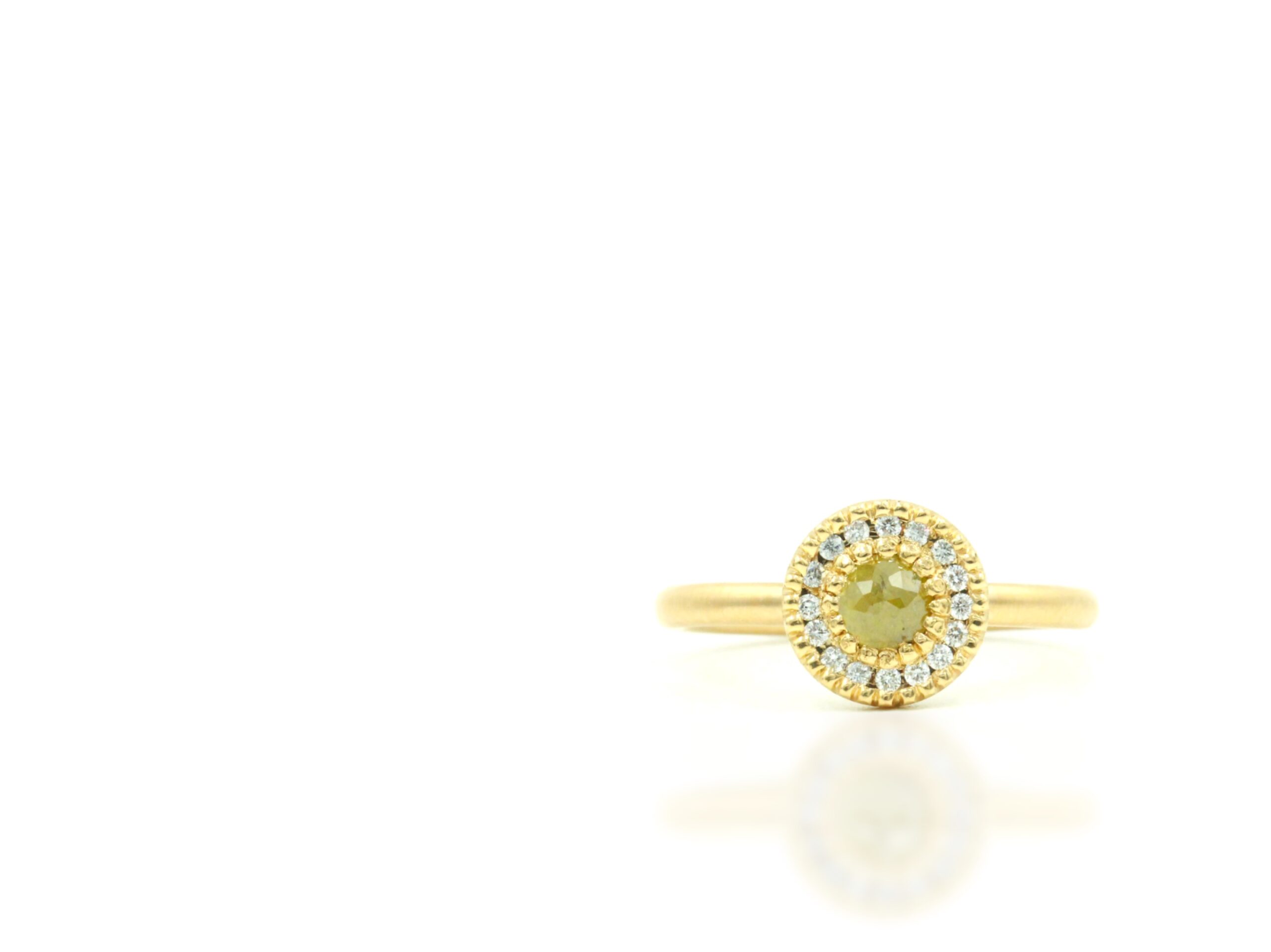 18k Yellow gold ring with .52 carat natural yellow diamond.
